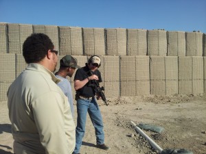  InDev Tactical advisor providing instruction during live-fire training exercise 